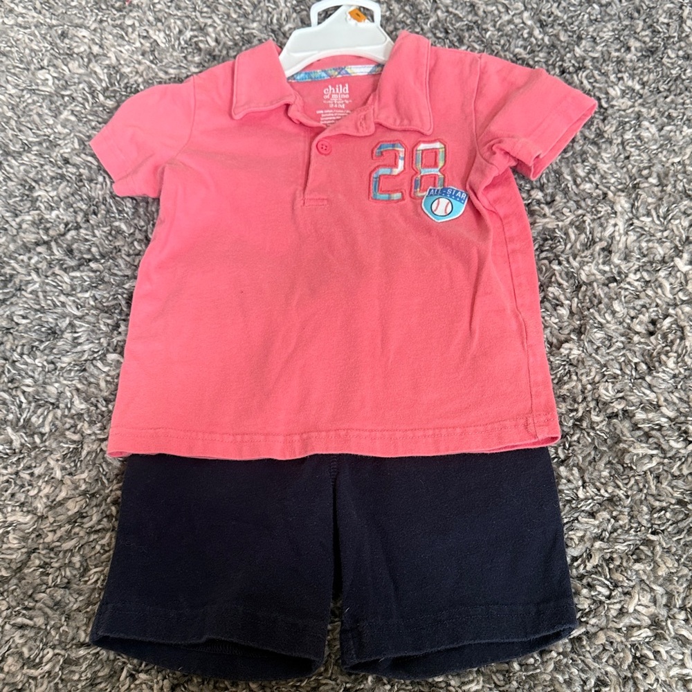 Pink Polo Shirt with Navy Shorts
